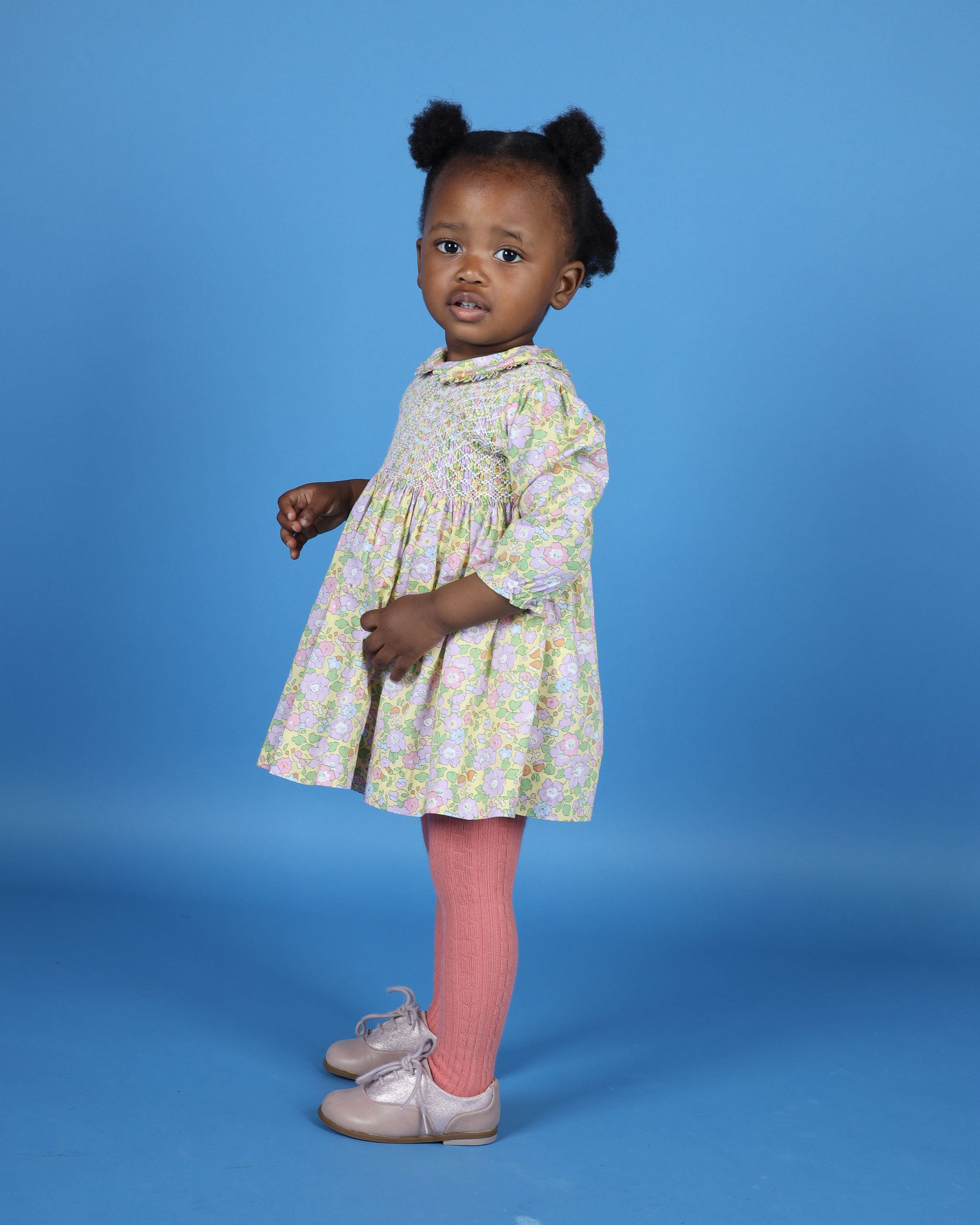 baby in smocked Liberty Print Dress