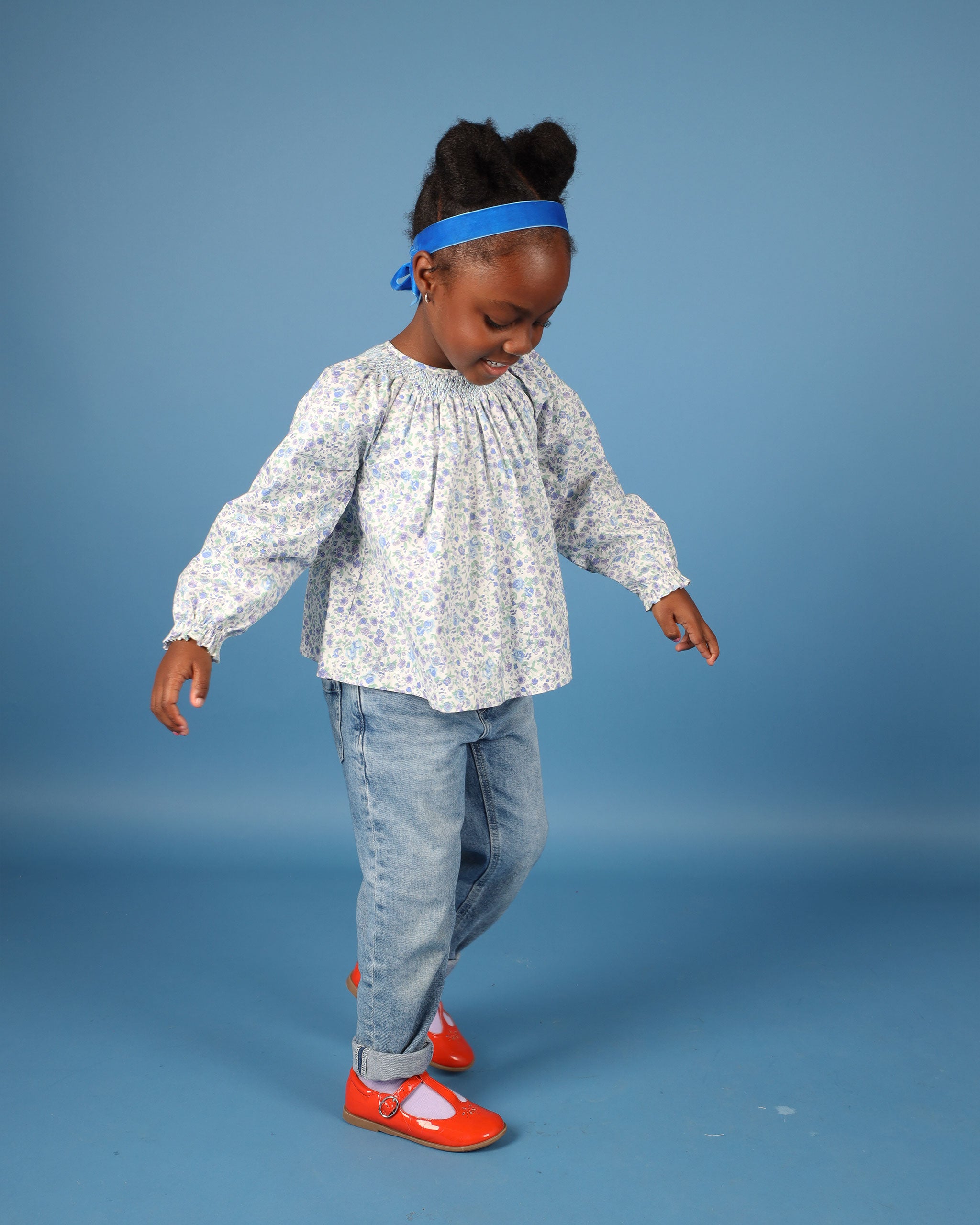 Girl in hand-smocked blouse