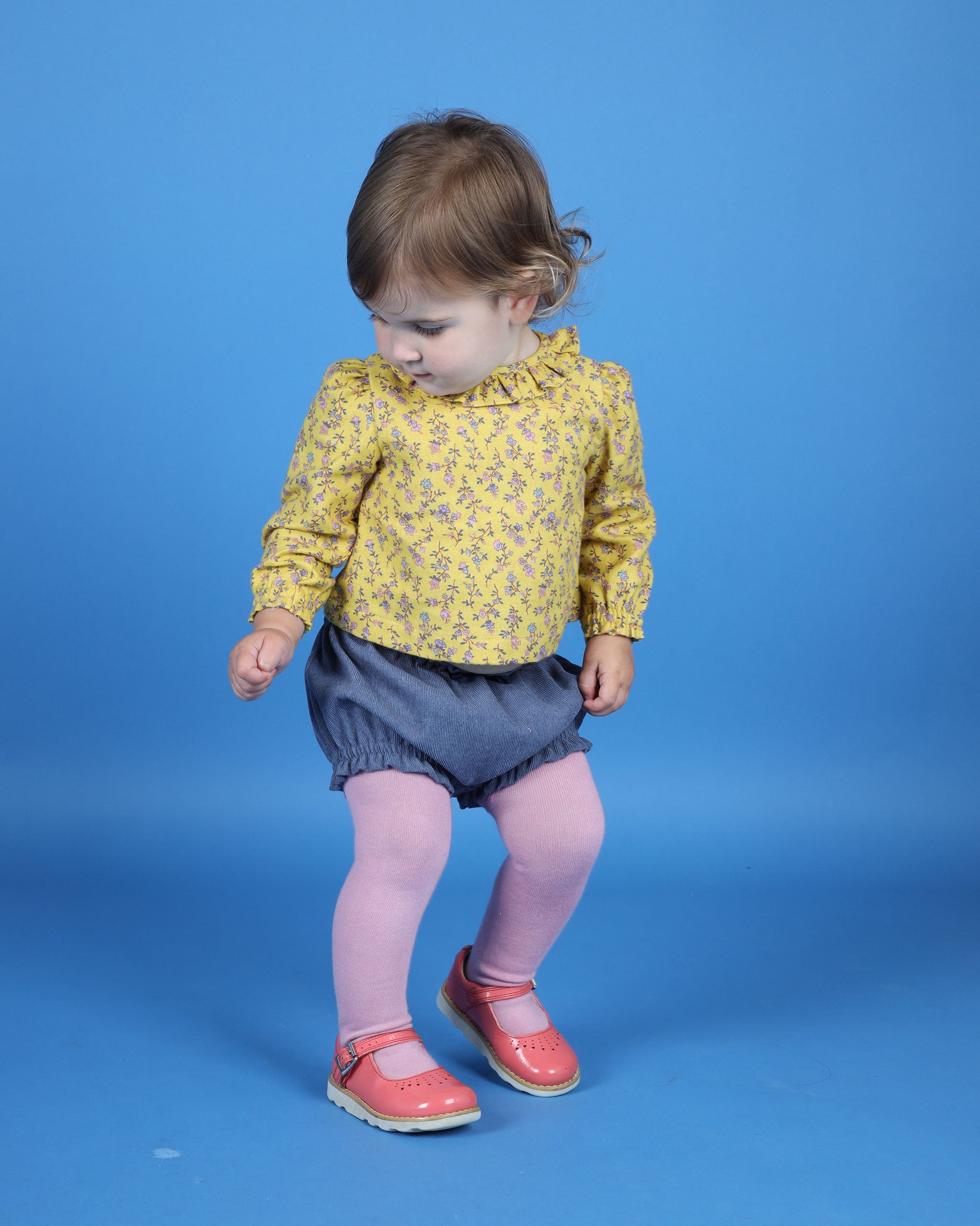 baby in blouse and shorts for  fall