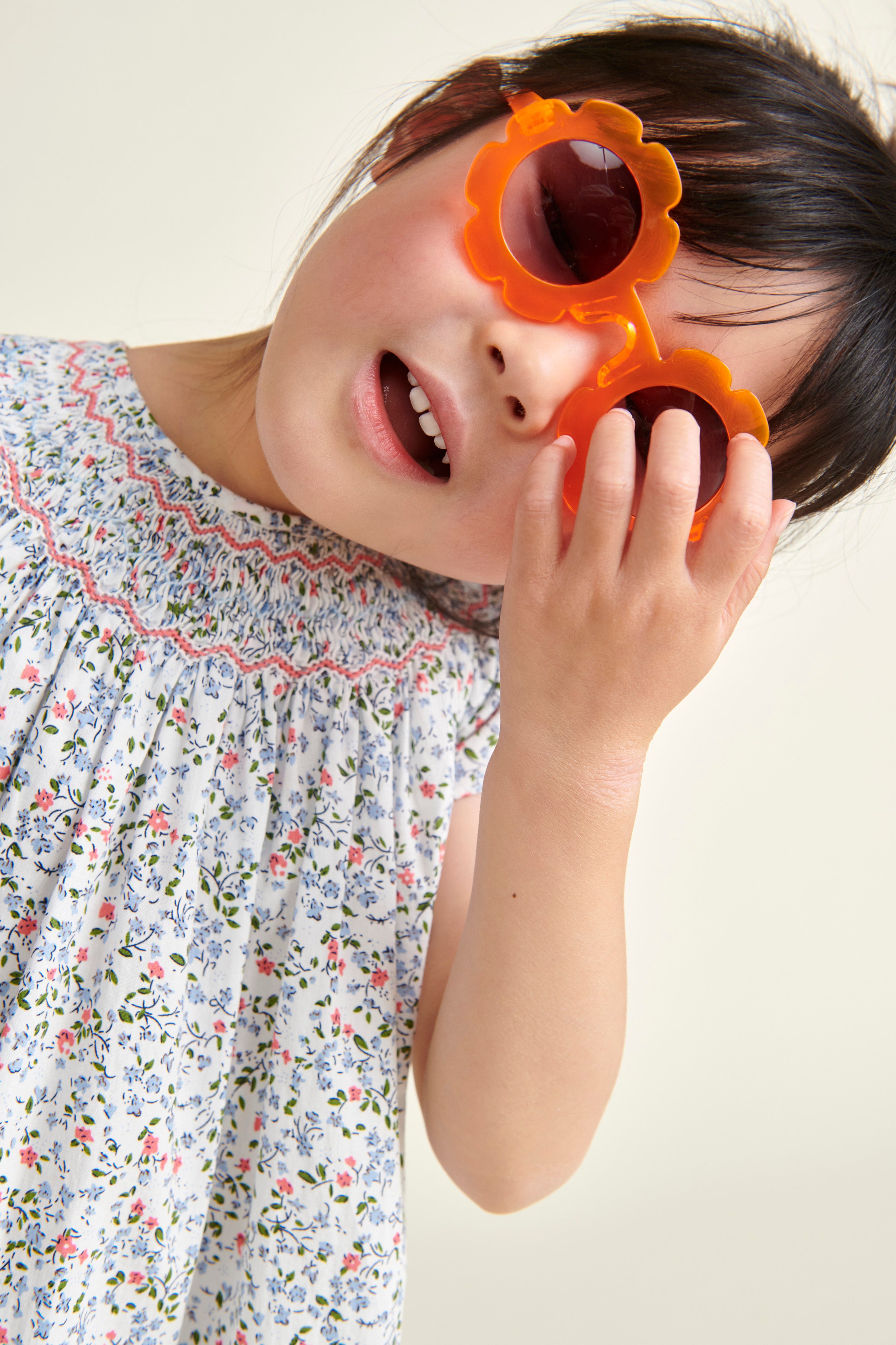 smocked blouse worn by girls, closeup