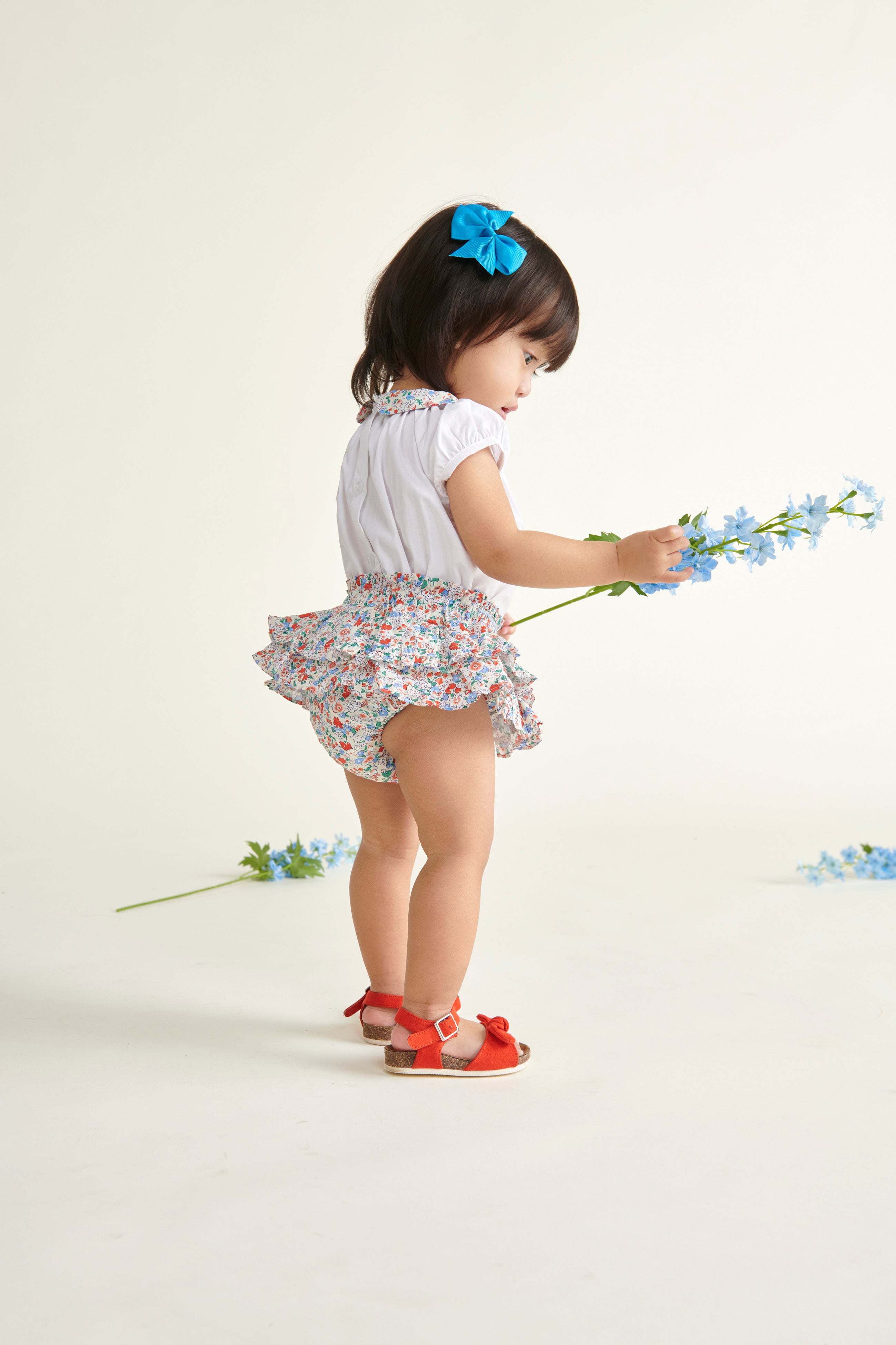 toddler girl in matching skort and blouse