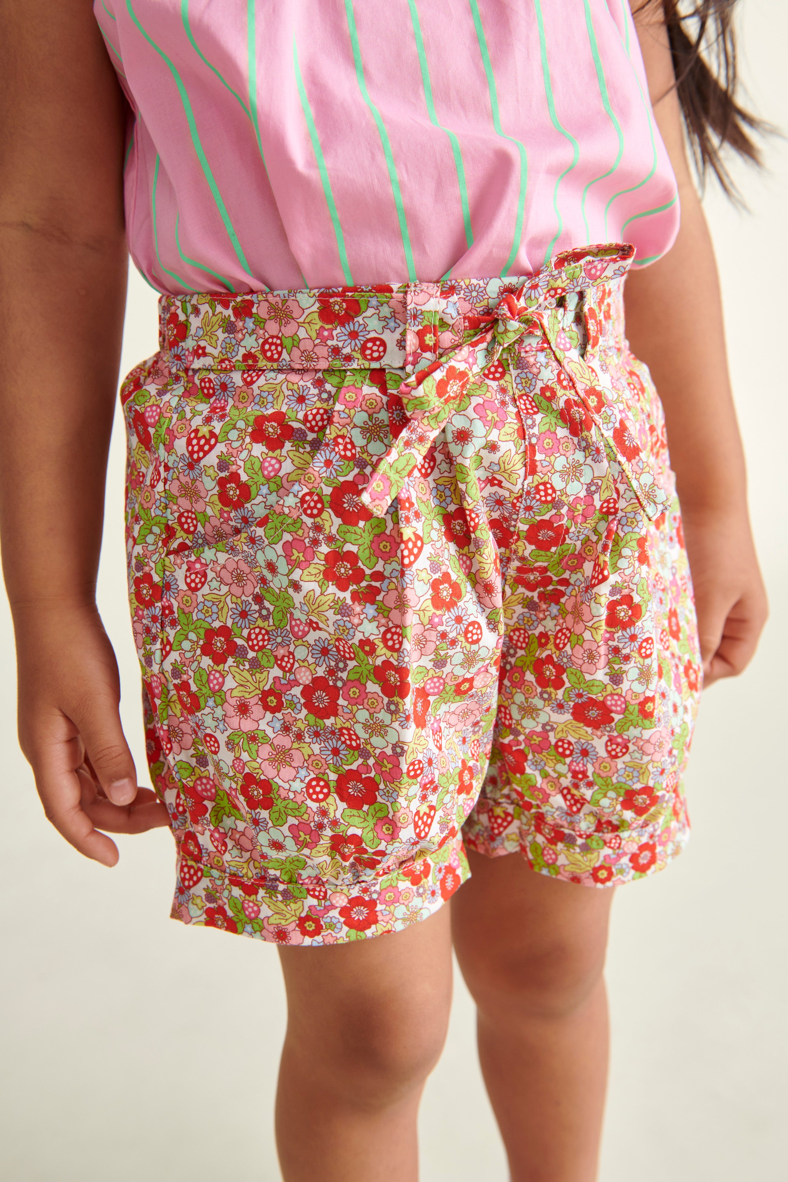 girls vibrant shorts in red and green