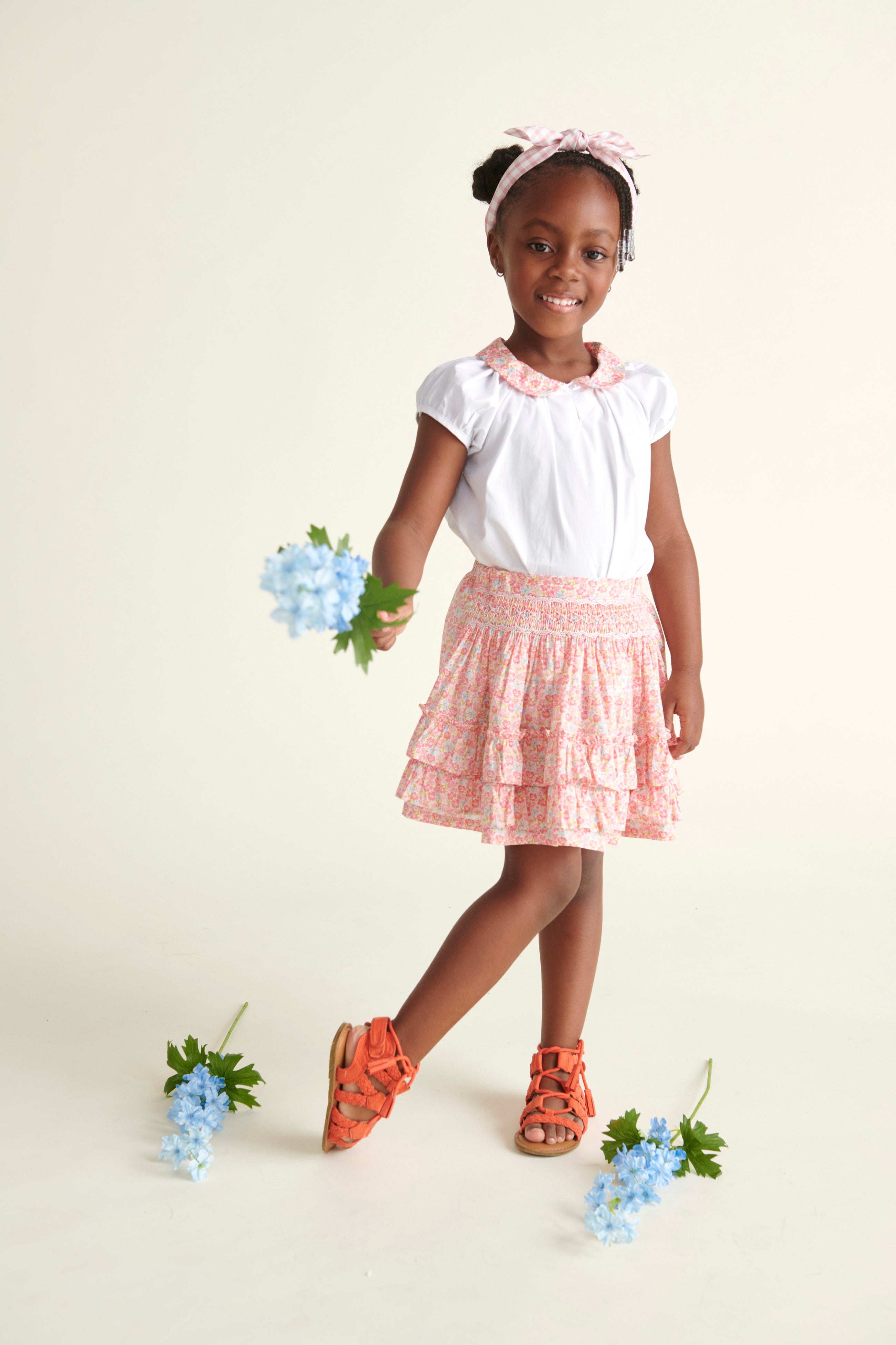 girl in matching skirt and blouse