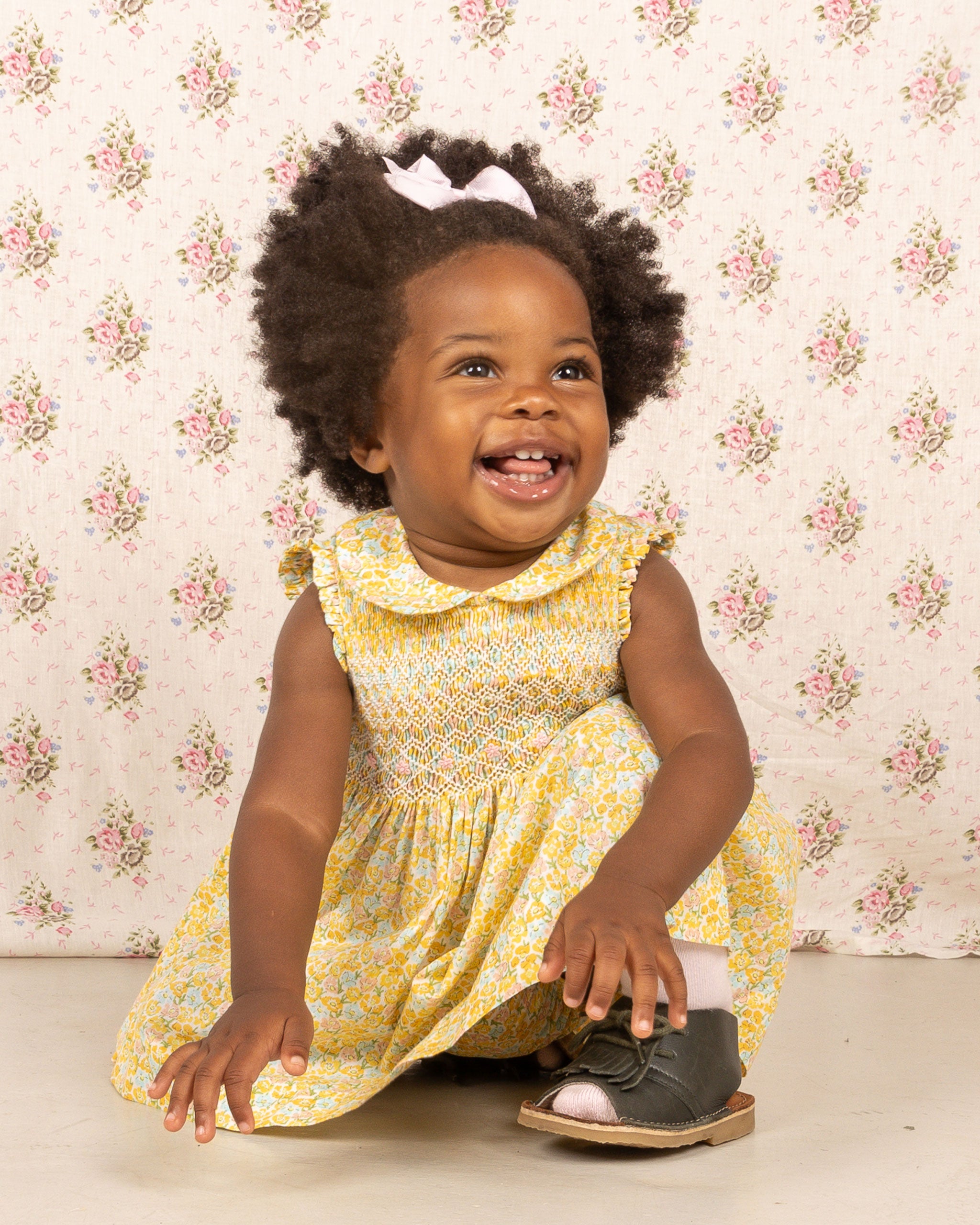 Baby girl in yellow dress hotsell