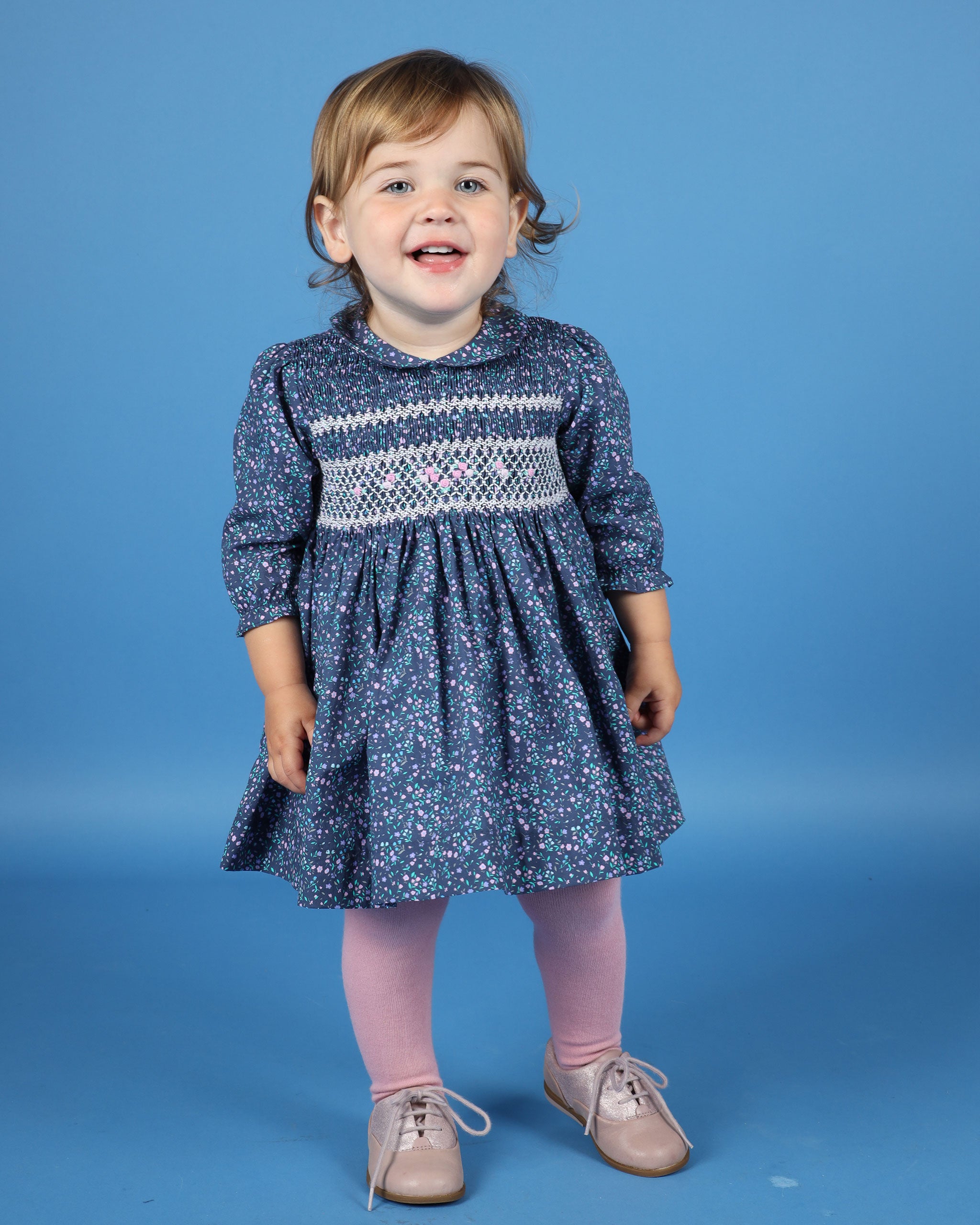 girl in smock dress, navy 