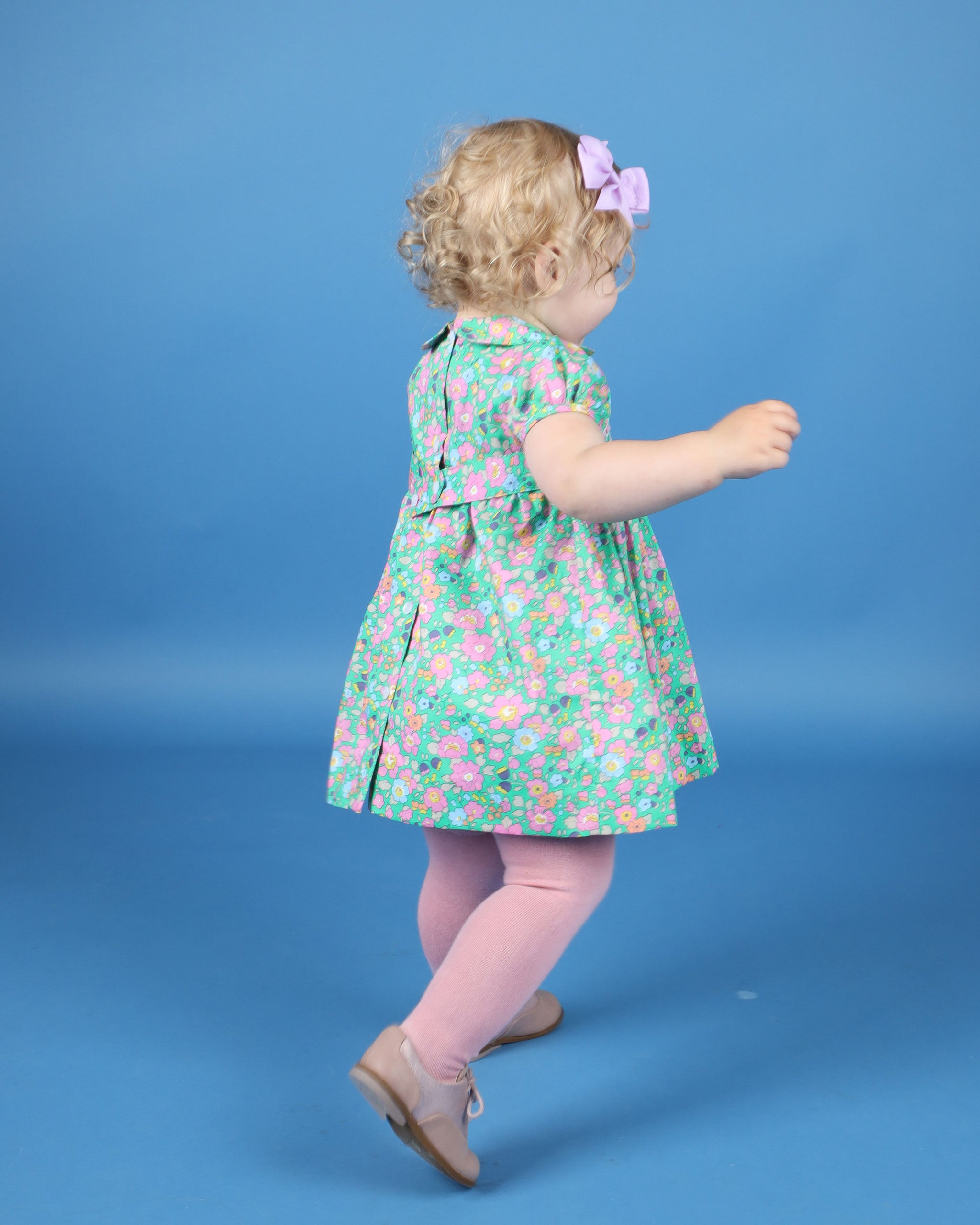 back of smocked dress, worn by toddler girl