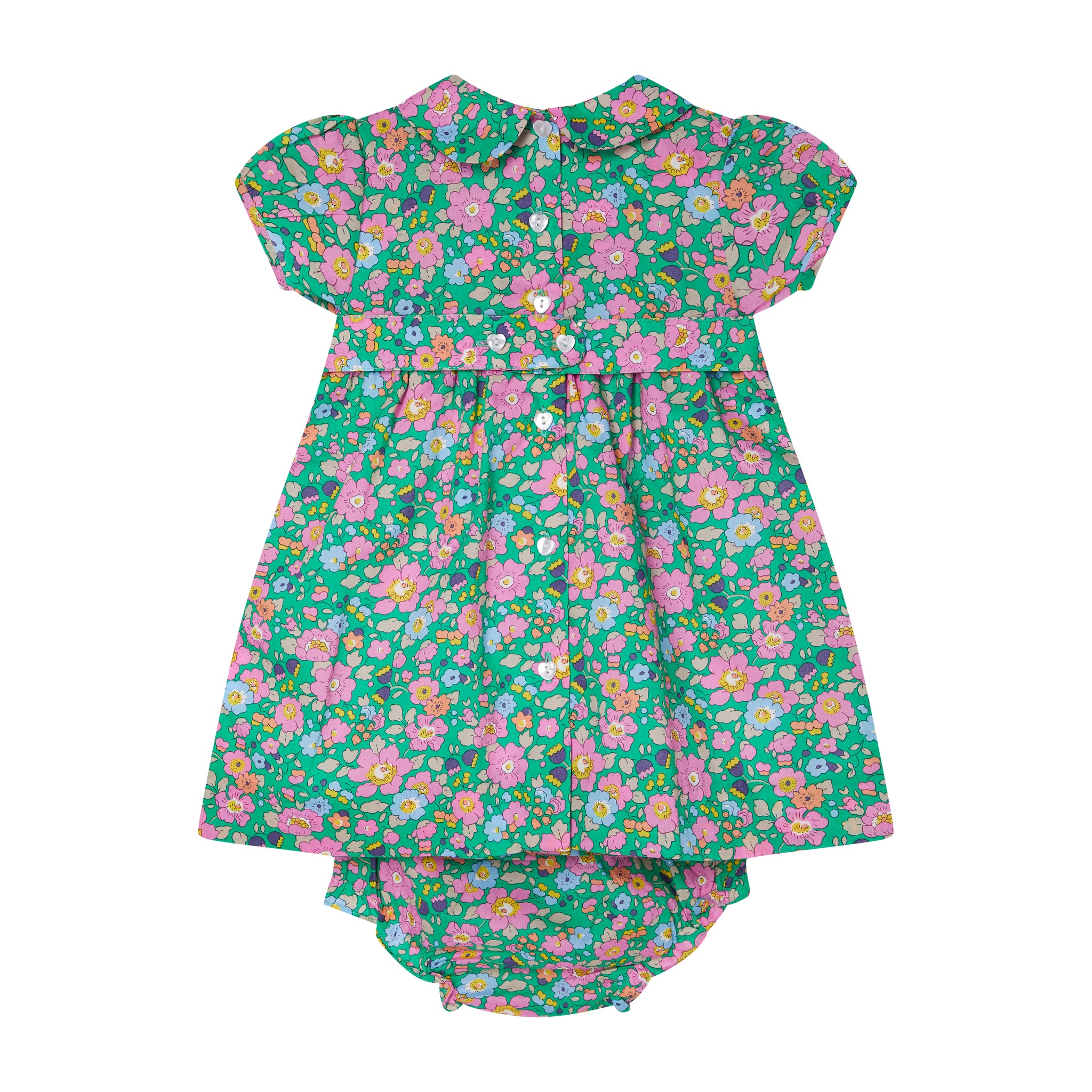 green floral smocked baby dress made from Liberty fabric