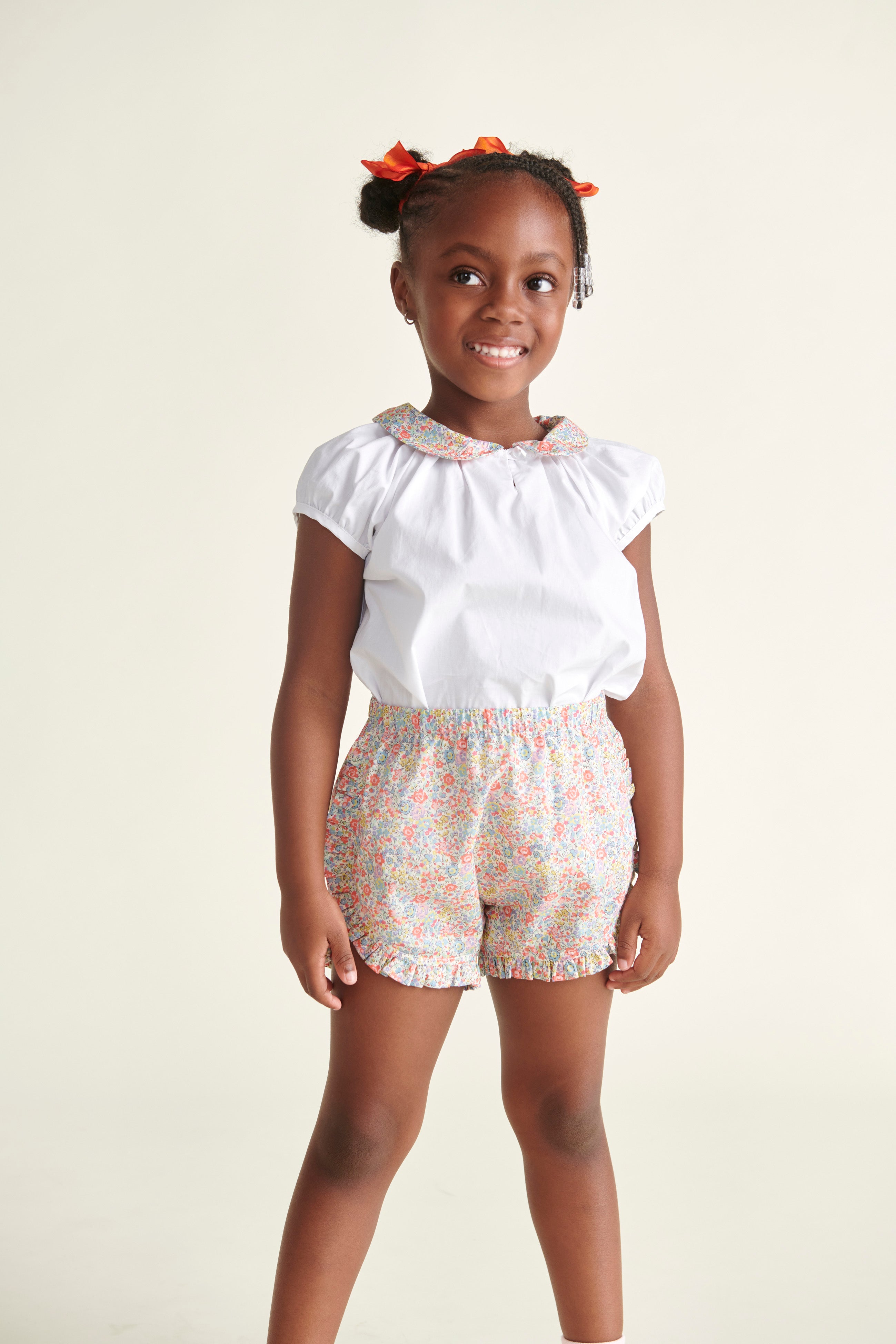 girl in matching shots and blouse outfit, floral, Liberty fabric and white cotton