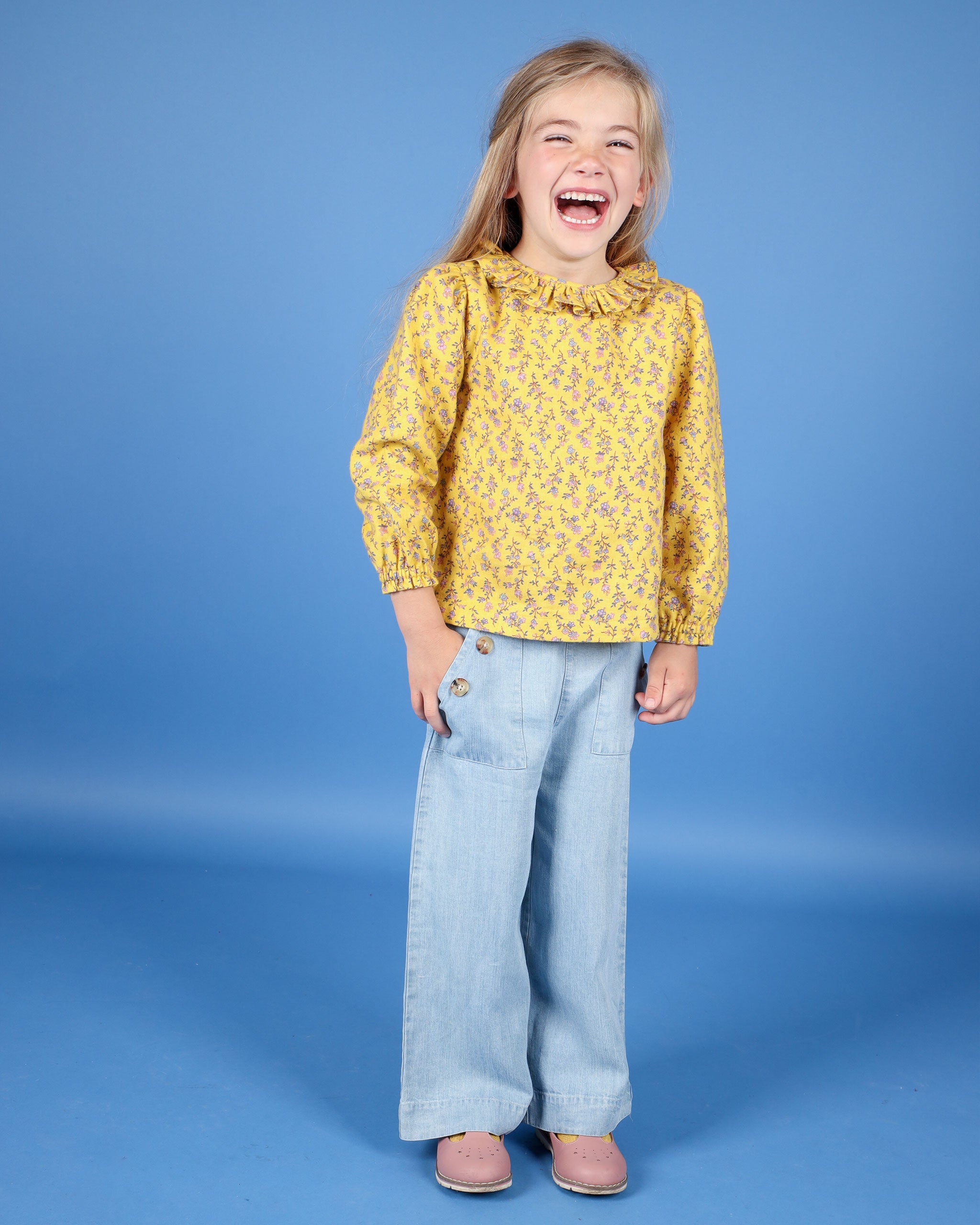 girl in yellow blouse