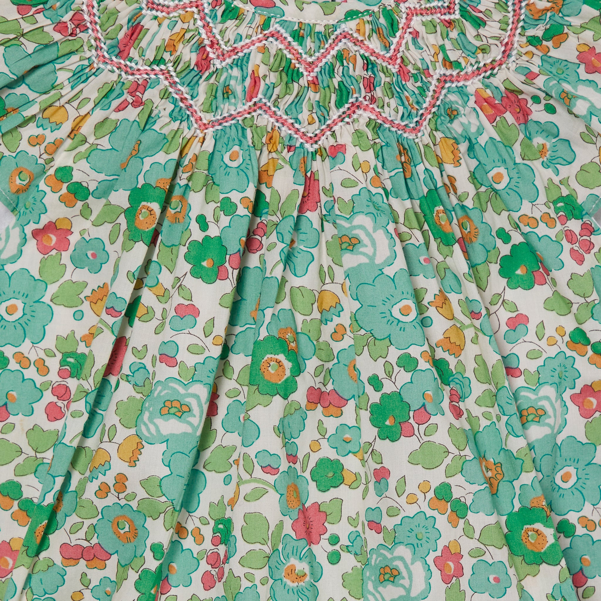 Liberty fabric baby romper, Betsy green, detail