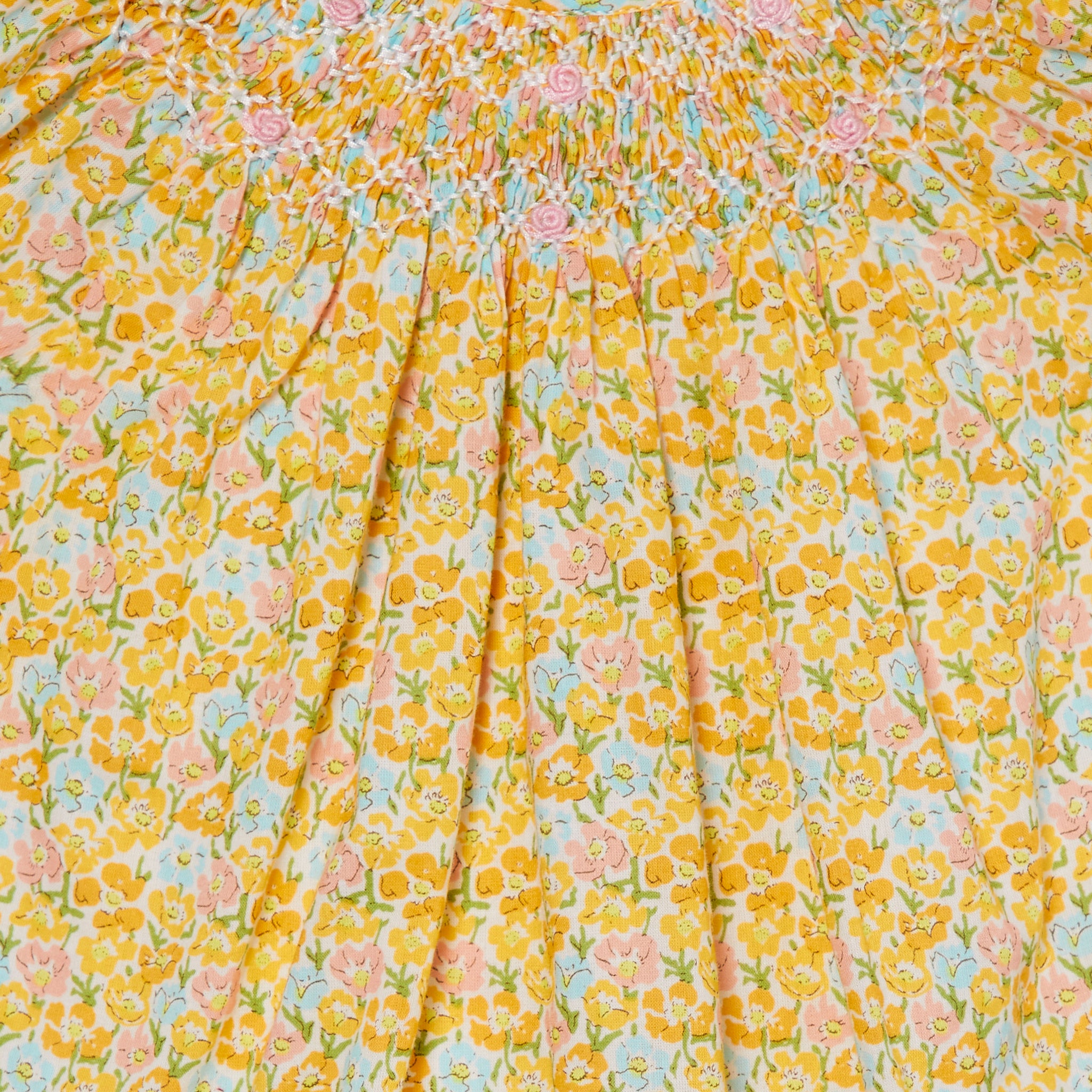 yellow floral baby bubble, smocking detail