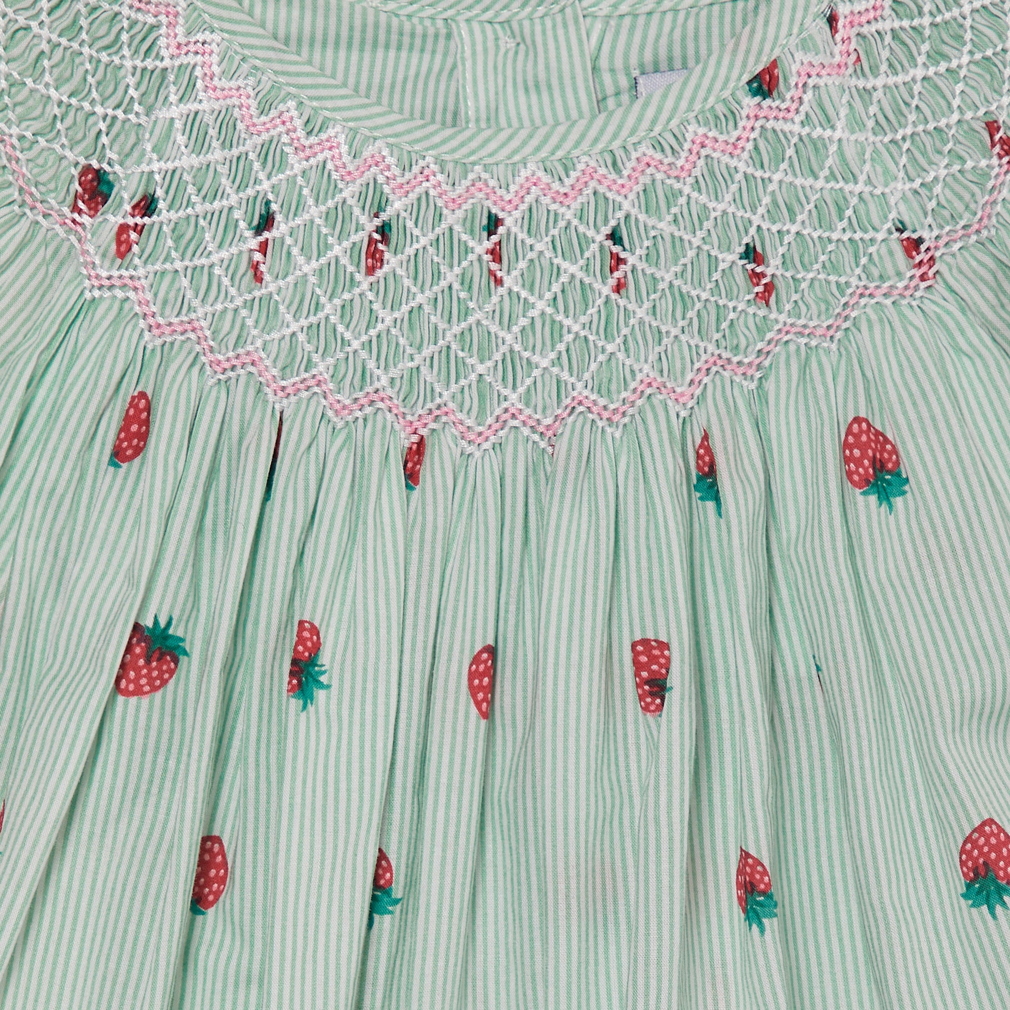 mint and strawberry baby dress, close up of smocking