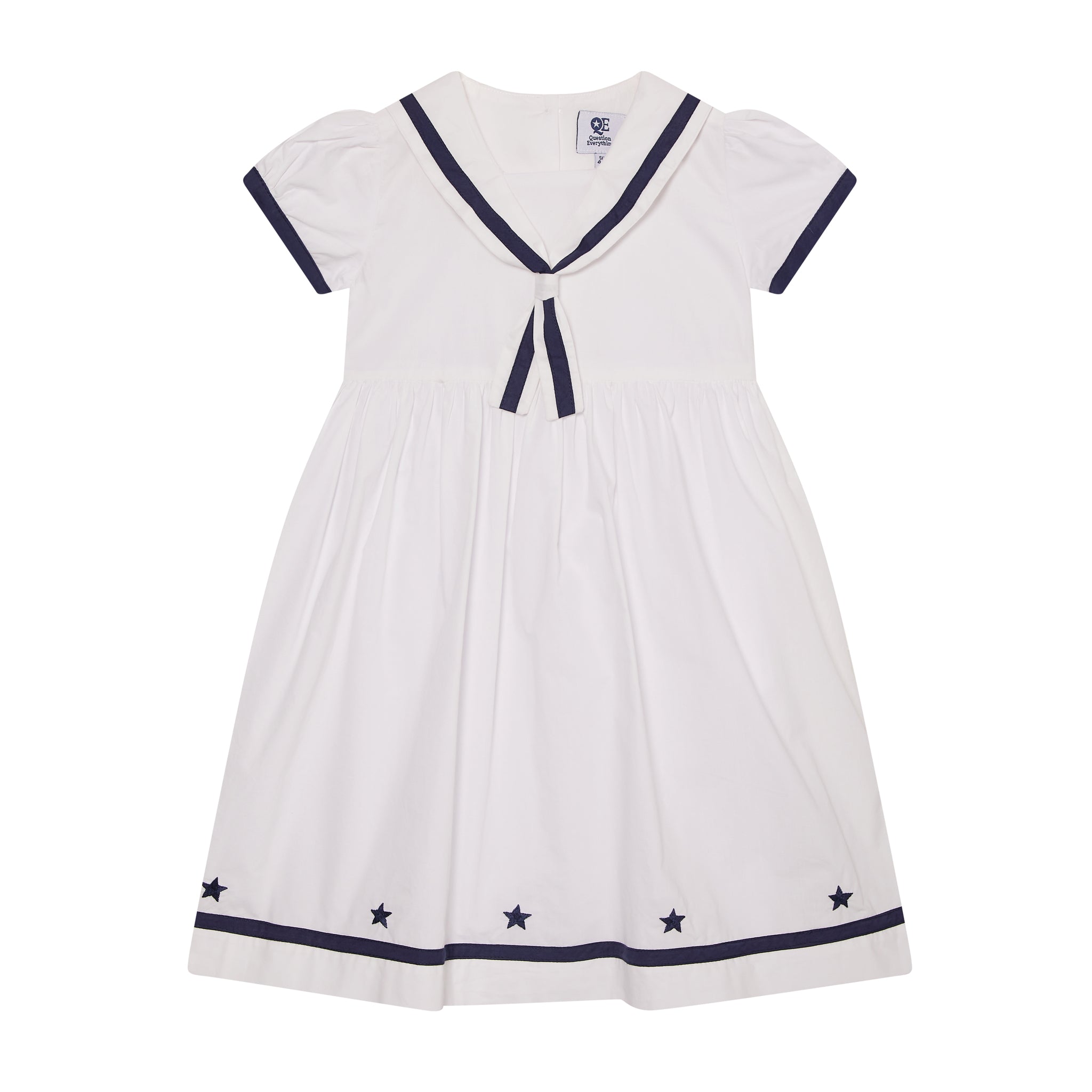 crisp white sailor dress with nary trims and star embroidery